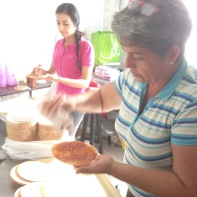 Preparing a traditional dessert from Colombia, "Obleas" for our weekly outreach ministry.